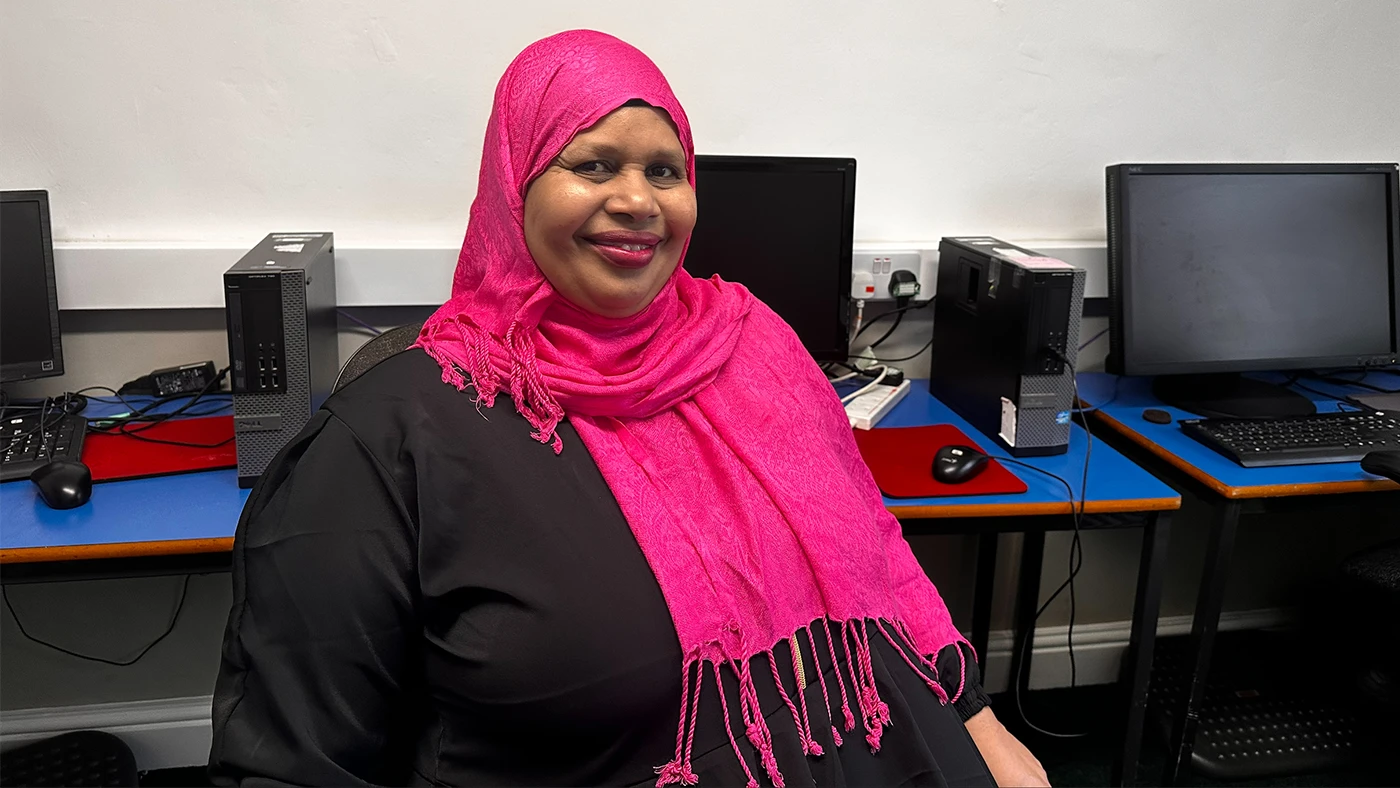 Woman in computer room doing a Learn My Way course