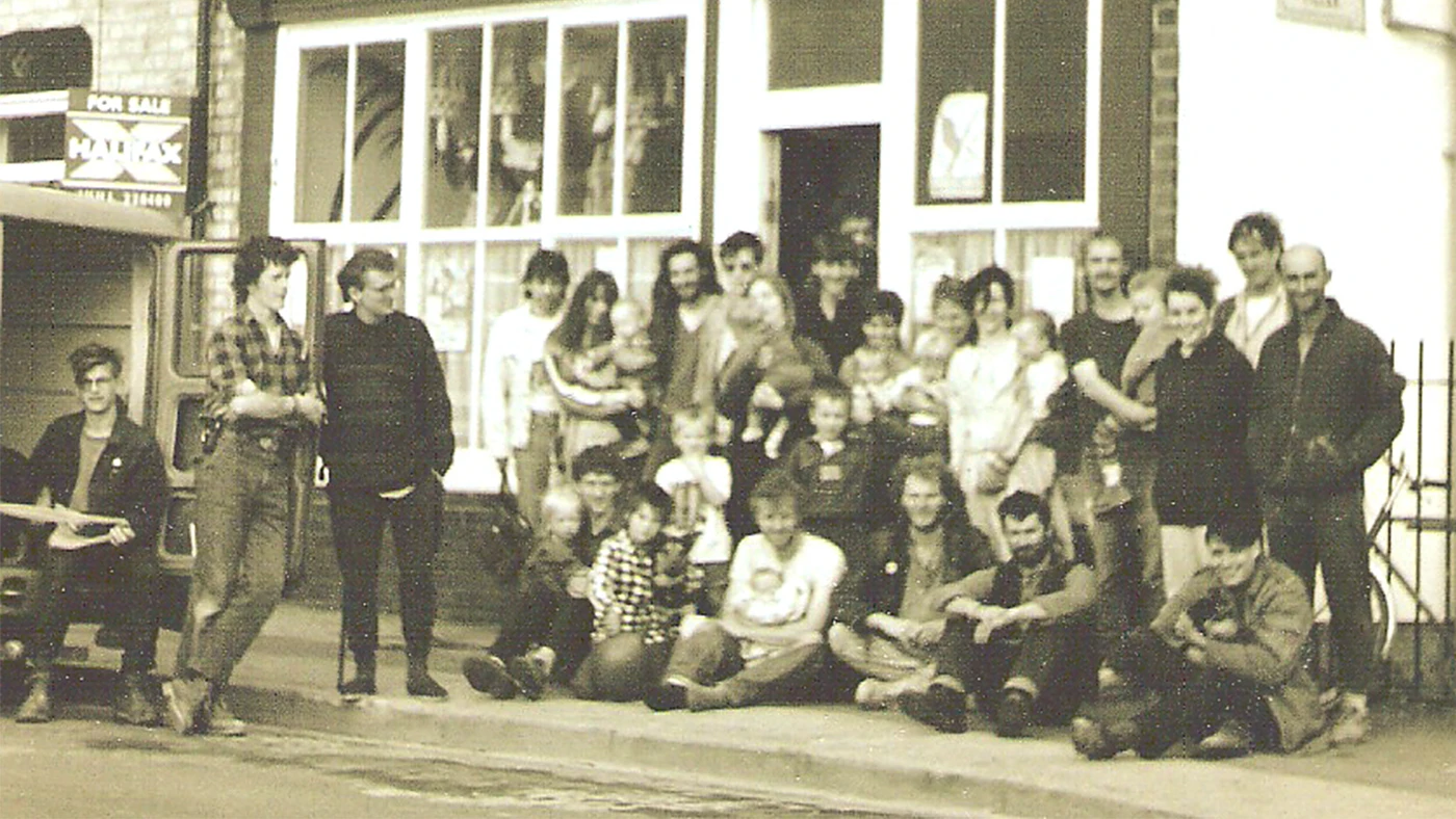 A group photograph of members of the Giroscope workers' cooperative