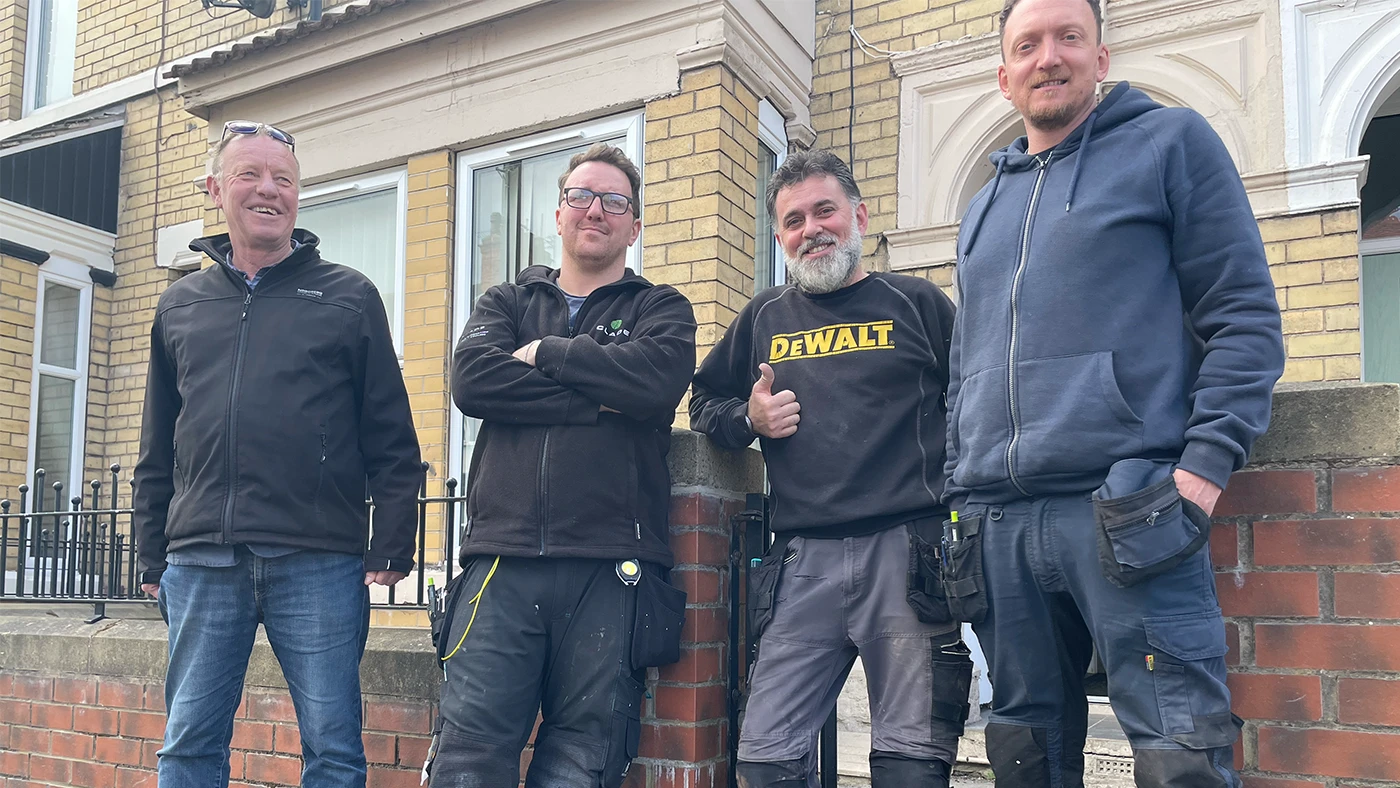 Group of Giroscope team outside the new house in Hull
