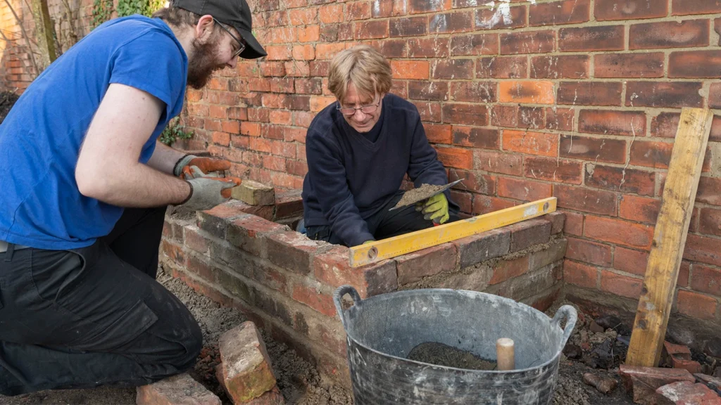 Sycamore Gardening volunteers building coldframe